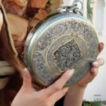 Unique Handcrafted Iranian Clutch: Circular Engraved Design